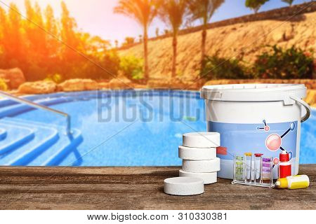 Equipment With Chemical Cleaning Products And Tools For The Maintenance Of The Swimming Pool.