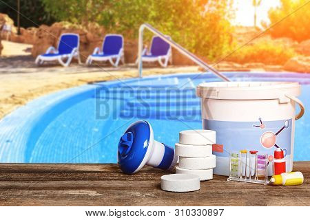 Equipment With Chemical Cleaning Products And Tools For The Maintenance Of The Swimming Pool.