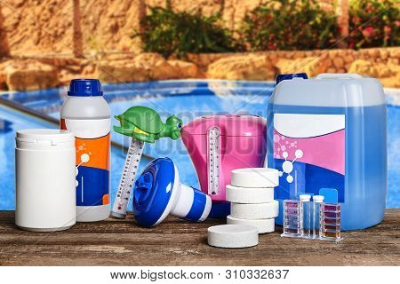 Equipment With Chemical Cleaning Products And Tools For The Maintenance Of The Swimming Pool.