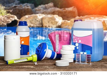 Equipment With Chemical Cleaning Products And Tools For The Maintenance Of The Swimming Pool.