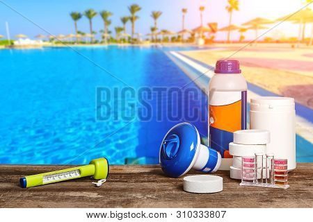 Equipment With Chemical Cleaning Products And Tools For The Maintenance Of The Swimming Pool.