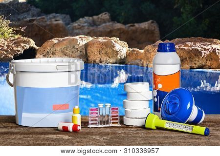 Equipment With Chemical Cleaning Products And Tools For The Maintenance Of The Swimming Pool.