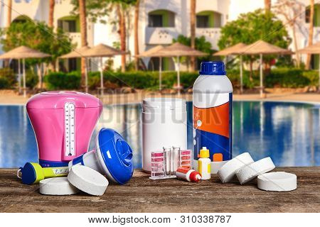 Equipment With Chemical Cleaning Products And Tools For The Maintenance Of The Swimming Pool.