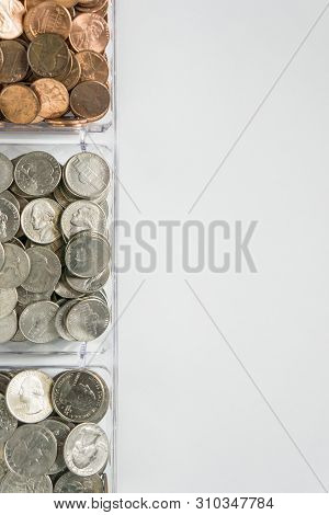 Organized Loose Coin Change On Left Side, Blank Empty Room Space For Text Right