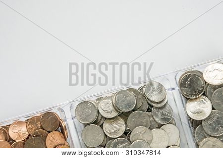 Organized Loose Coin Change On Bottom Side, Blank Empty Room Space For Text Top