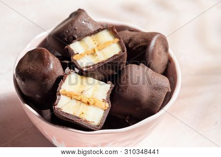 Frozen Healthy Dessert. Dark Chocolate Peanut Butter Banana Bites
