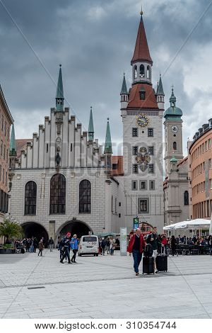Munich, Bavaria, Germany - May 29, 2019. Tourists Walking Around In Front Of The New Townhouse (neue
