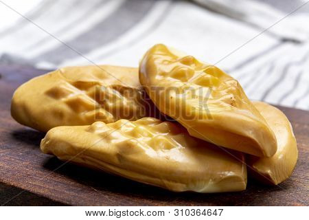 Oscypek Or Oszczypek Smoked Cheese Made Of Salted Sheep Milk Exclusively In Tatra Mountains, Zakopan