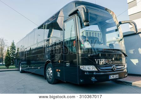 RUSSIA, KALININGRAD KOENIGSBERG -APRIL 13, 2019 : Modern Black Passenger Bus on the Parking Lot