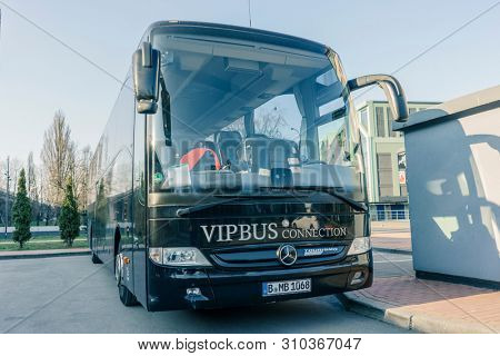 RUSSIA, KALININGRAD KOENIGSBERG -APRIL 13, 2019 : Modern Black Passenger Bus on the Parking Lot