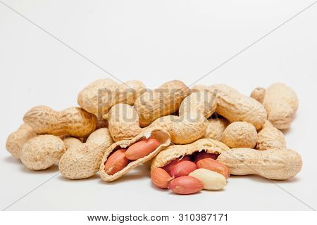 Large Peeled Peanuts Close-up Of Beans In The Shell. Unpeeled Peanuts In The Shell. Peanuts, For Bac