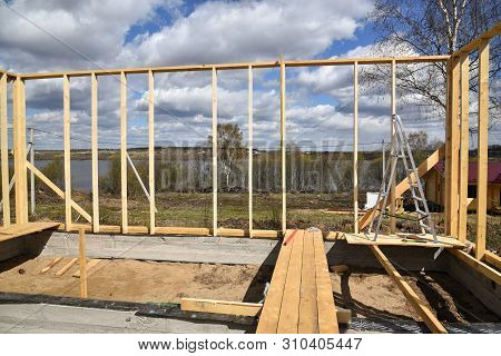 Construction Home Framing Against Blue Sky.wood Frame Residential Building Under Construction.buildi