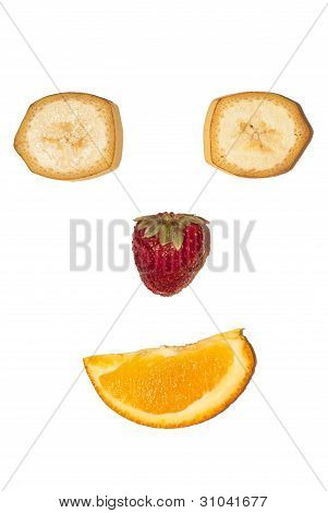 Frutta faccia sorridente con fragola