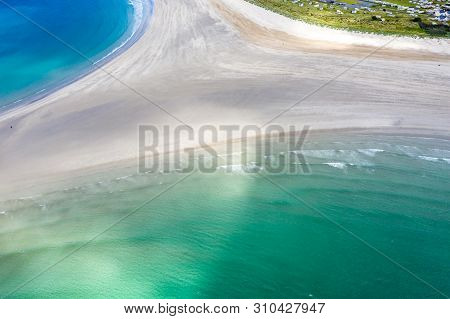 Aerial View Of The Awarded Narin Beach By Portnoo And Inishkeel Island In County Donegal, Ireland