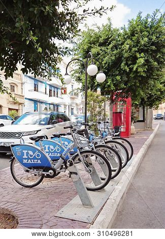 Naxxar, Malta - September 29, 2018: Maltas Public Bicycle Sharing Dock Station In Naxxar. Bicycle Sh