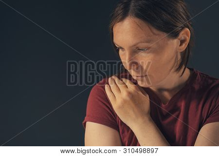 Sensual Melancholic Female Portrait, No Makeup And No Retouching. Adult Caucasian Woman Looking Let 