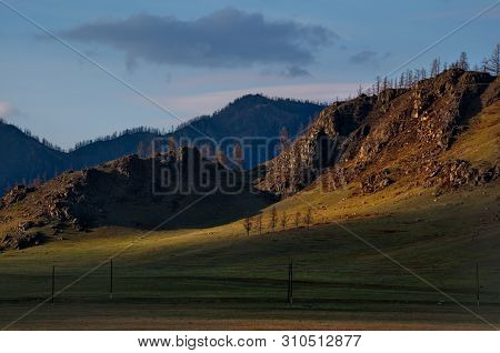 Russia. Mountain Altai. The Surrounding Mountains Regional Center Onguday Along Tchuisky Highway.