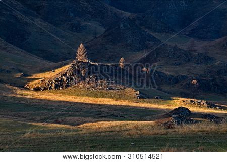 Russia. Mountain Altai. The Surrounding Mountains Regional Center Onguday Along Tchuisky Highway.