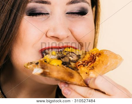 Woman Eating Hot Pizza Slice