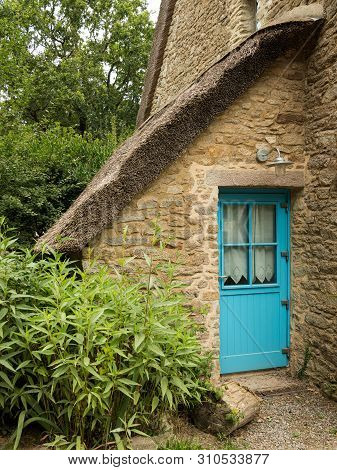 Old House In Saint Lyphard (france) With A Thatched Roof