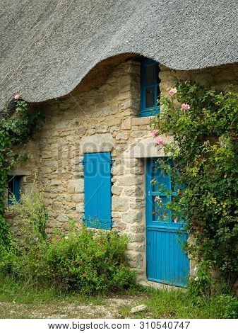 Old House In Saint Lyphard (france) With A Thatched Roof