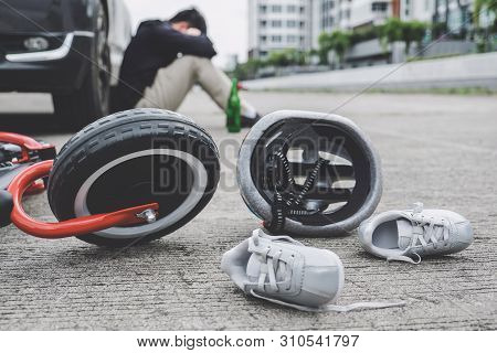 Image Of Shocked And Scared Driver After Accident Involved Kid's Bike And Helmet Lying On The Road O