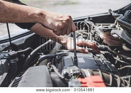 Services Car Engine Machine Concept, Automobile Mechanic Repairman Hands Repairing A Car Engine Auto