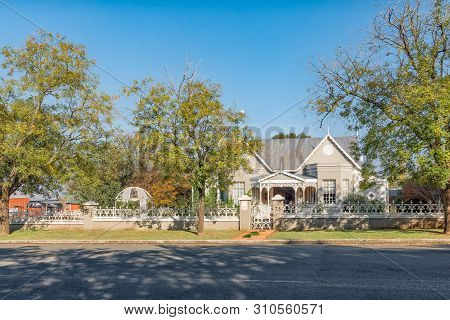 Standerton, South Africa - May 2, 2019: A Street Scene, With An Historic House, In Standerton, In Th