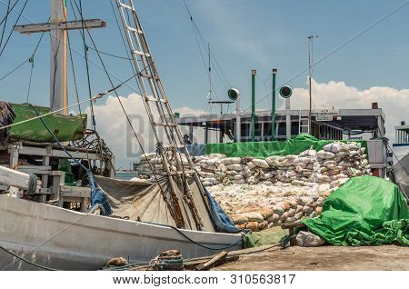 Makassar, Sulawesi, Indonesia - February 28, 2019: Paotere Old Port. White Amran Berkembang Island T