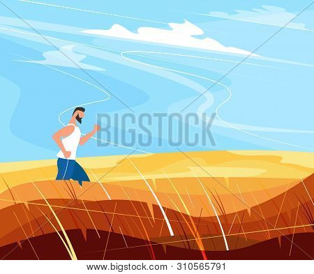 Sportsman Runs In Countryside Landscape. Rural Landscape With Golden Hills And Blue Sky. Beautiful S