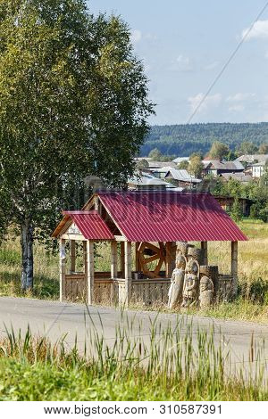Visim, Russia - June 22, 2015. Wooden Well In The Village Visim. Ural, Sverdlovsk Region Russia