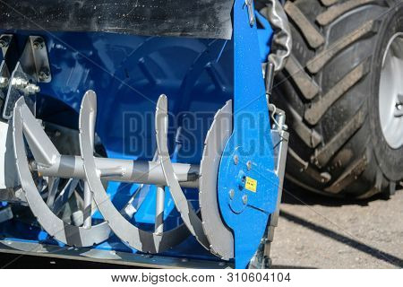 Image of a part of snow-removal mini tractor