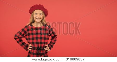 Wear Beret Like Fashion Girl. Kid Little Cute Girl With Long Blonde Hair Posing In Beret Hat And Che