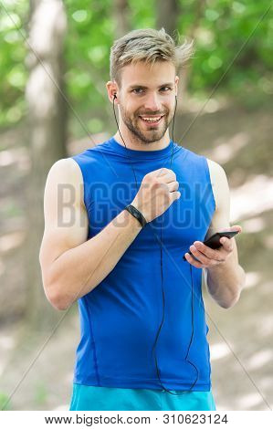 Set Up Application. Sportsman With Smartphone And Smart Watch Prepare For Jog. Training With Sport A