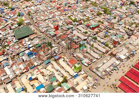 Streets Of Poor Areas In Manila. The Roofs Of Houses And The Life Of People In The Big City. Poor Di