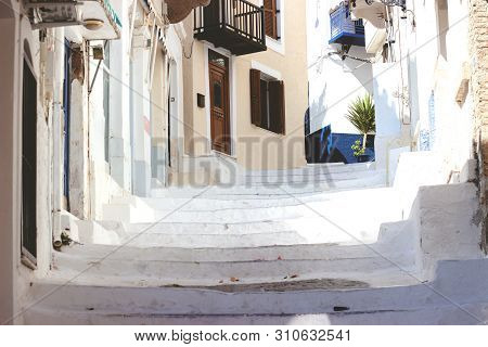 Stairs In The Narrow Street Of Neorio Town On Poros Island, Greece; Summer Background