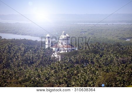Aerial Panoramic View Old Goa. Mandovi River And Ancient Churche