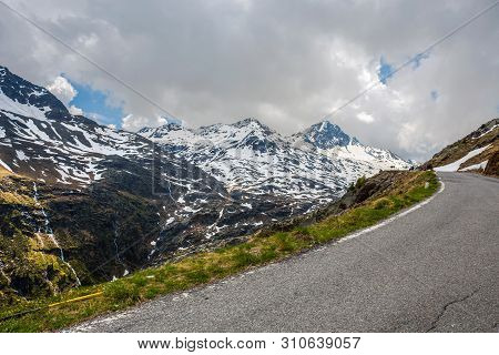 View From The Gavia Pass, An Alpine Pass Of The Southern Rhaetian Alps, Marking The Administrative B