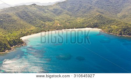 Sea Bay With Turquoise Water And A Small White Beach.coast Of The Island Of Camiguin, Philippines.be