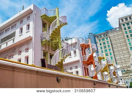 Colorful Spiral Stairs Of Singapore Apartment, Landmark And Popular For Tourist Attractions In Bugis