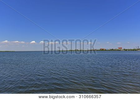Calm In The Sea Bay. Berdyansk Spit Is Located In The North Of The Azov Sea, Separating The Gulf Of 