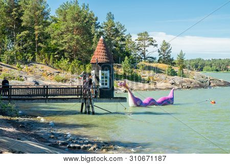 Naantali, Finland - 28 June, 2019: Bathing Hut And Edvard The Booble In Park Moominworld At Sunny Su