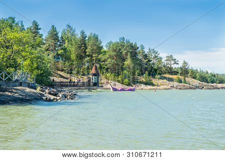 Naantali, Finland - 28 June, 2019: Bathing Hut And Edvard The Booble In Park Moominworld At Sunny Su