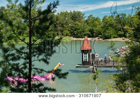 Naantali, Finland - 28 June, 2019: Bathing Hut And Edvard The Booble In Park Moominworld At Sunny Su