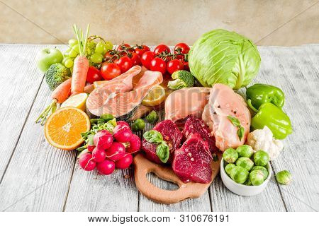 Trendy Pegan Diet - Vegan Plus Paleo Diet Food Concept, Many Fresh Vegetables, Fruits, Raw Beef And 
