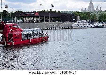 Moscow, Russia - July 8, 2019: Red Pleasure Boat On The Moskva River. The View From The Berezhkovska