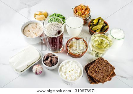 Super Healthy Probiotic Fermented Food Sources, Drinks, Ingredients, On White Marble Background Copy