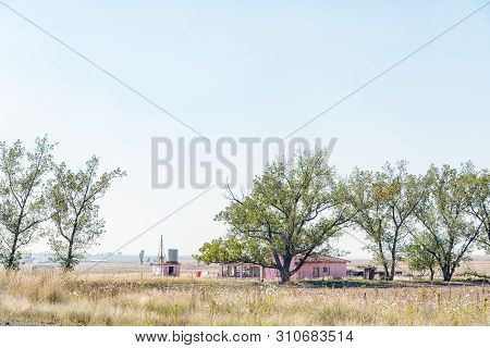 Bethal, South Africa - May 2, 2019: A Farm Landscape, With A House, Next To Road R38 Between Stander