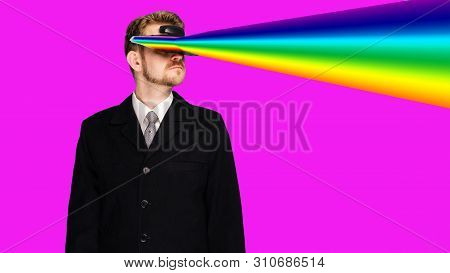 Businessman In A Formal Wear Wearing Virtual Reality Glasses Projecting Rainbow Rays From The Eyes -