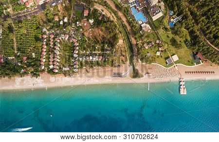 Aerial View On The Coastline Of The Settlement Of Beldibi, A Lodges, Beach And Small Hotels In Vicin